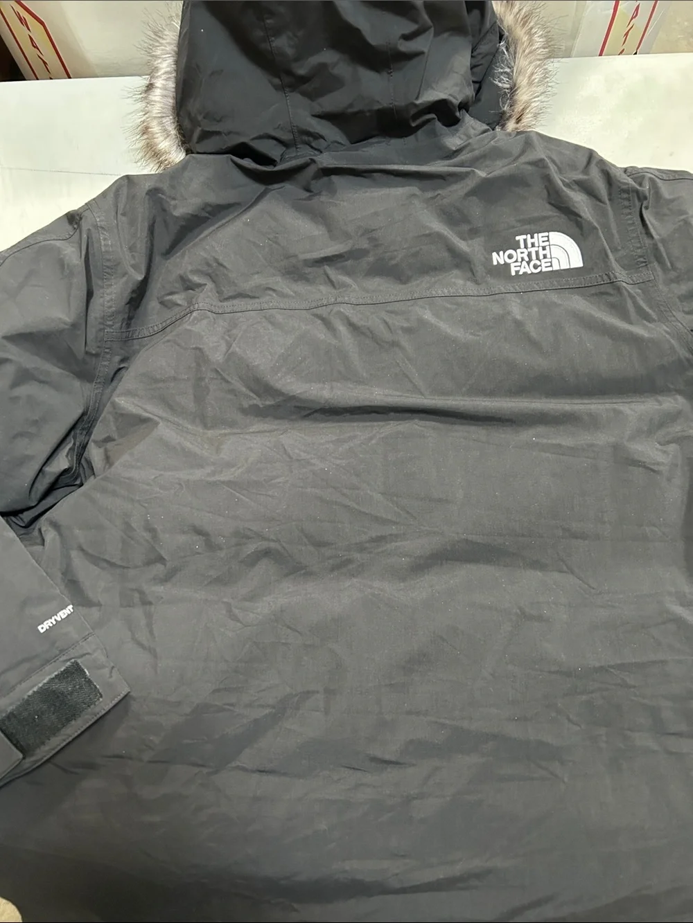 The North Face Black Men’s Insulated Puffer Jacket with Faux Fur Hood